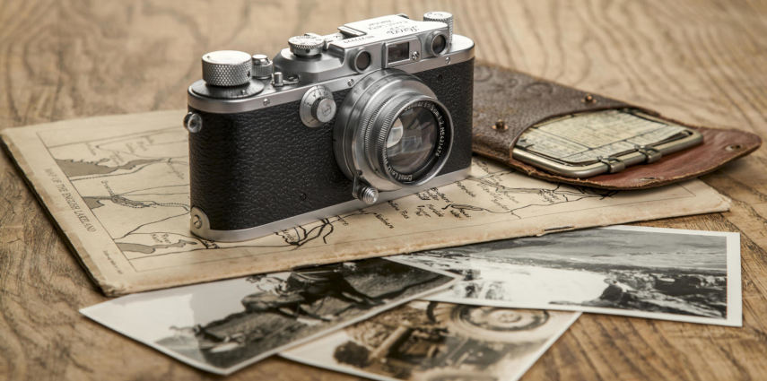 <p>Wales, Monmouthshire, Monmouth. Vintage Leica camera and Kaufmann Posographe.</p>
